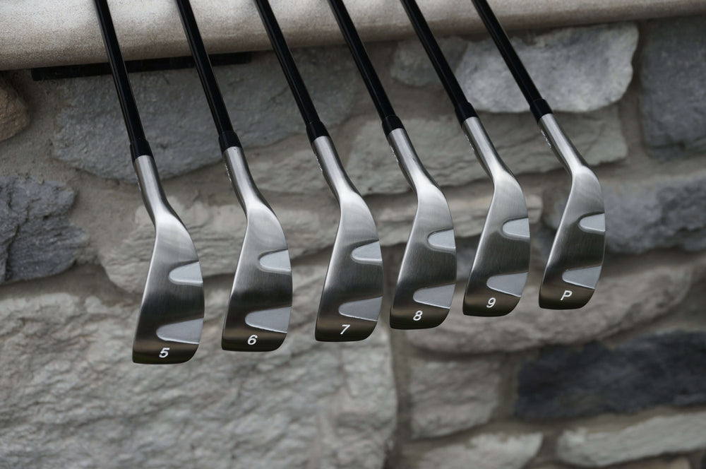 NOVA Hybrid Irons showcasing numbered clubs 5, 6, 7, 8, 9, and P for enhanced performance.