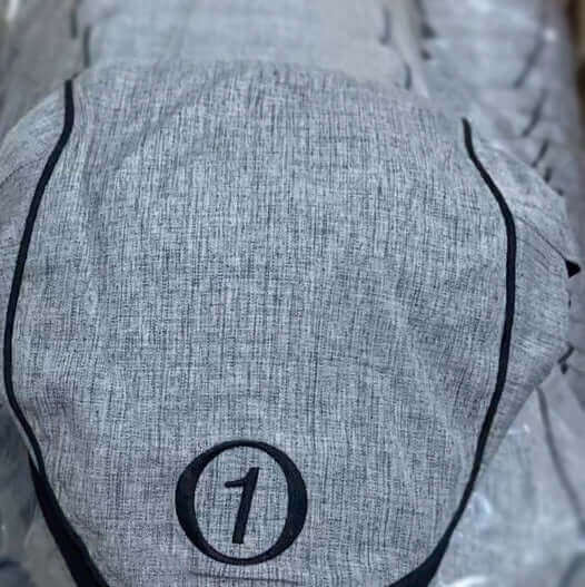 Flat Caps - 3 Color Options showing the front of Gray
